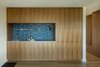 Modern home with Storage Room and Cabinet Storage Type. Bar in the dining room with a patterned tile from the Modern line at Ann Sacks. Photo 9 of Mt. Tabor