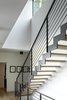 Modern home with Staircase, Metal Railing, and Wood Tread. Staircase Photo 11 of Riverwood