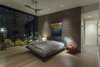 Modern home with Bedroom, Light Hardwood Floor, Bed, Recessed Lighting, and Chair. The master bedroom opens to the exterior. The blockwork creates an accent wall for the master bed and flows from inside to out. Photo 5 of Arroyo House