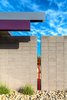 Modern home with Exterior, Metal Roof Material, and Concrete Siding Material. Detail of the rain water collection scupper, exposed central beam and entry wall. Photo 9 of Arroyo House