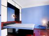 Modern home with Bedroom, Wardrobe, Night Stands, Bed, Chair, Storage, Ceiling Lighting, Table Lighting, Wall Lighting, Pendant Lighting, Accent Lighting, and Medium Hardwood Floor. master bedroom with large foldable bed, redesigned based on historic photographs Photo 10 of Taut´s Home (Tautes Heim) - Rentable museum of design and architecture of the 1920s
