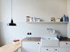 Modern home with Kitchen, Laminate Counter, White Cabinet, Wood Cabinet, Pendant Lighting, Track Lighting, Accent Lighting, Refrigerator, and Dishwasher. kitchen design, modern comfort hidden + fully applicable Photo 5 of Taut´s Home (Tautes Heim) - Rentable museum of design and architecture of the 1920s