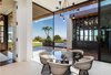 Modern home with Marble Floor. Breakfast area opens up to a private patio and pool house. Photo 15 of Trousdale Place Residence