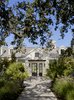 Modern home with Doors, Exterior, Metal, and Swing Door Type. Front entry pierces through the living room across the pool. Photo of Wine Country Cool