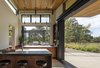 Modern home with Outdoor, Grass, Hanging Lighting, Stone Patio, Porch, Deck, Lap Pools, Tubs, Shower, Back Yard, and Trees. and your go-to burger joint is in the backyard. Photo 2 of Napa Pool House