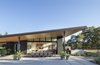 Modern home with Outdoor, Back Yard, Lap Pools, Tubs, Shower, Grass, Large Patio, Porch, Deck, Stone Patio, Porch, Deck, Hanging Lighting, Concrete Fences, Wall, and Trees. When taking a vacation is as simple as stepping outside. Photo 6 of Napa Pool House