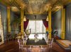 Modern home with Dining Room, Chair, Table, Lamps, Medium Hardwood Floor, and Pendant Lighting. Palace salon Photo 2 of GM Palace