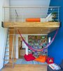 Modern home with Kids Room, Playroom Room Type, Bedroom Room Type, Medium Hardwood Floor, and Teen Age. Guest loft Photo 4 of The Right House