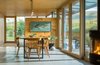 Modern home with Dining Room, Chair, Table, Pendant Lighting, Concrete Floor, and Wood Burning Fireplace. Dining Photo 5 of The Right House