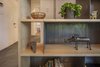 Modern home with Dining Room and Shelves. Open shelves in kitchen made from furniture grade plywood and raw steel. Photo 3 of Professors Row