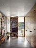 Modern home with Hallway. Artwork can also bring balance to a space, acting as a counterpoint to closets and doors, and introducing color schemes that play throughout the rest of the home. Photo 5 of LAKE AUSTIN HOUSE