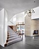 Modern home with Staircase. A unique scissor-like stair that stitches the first and second floors together from both sides of the house. Photo 8 of LAKE AUSTIN HOUSE