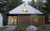 Modern home with Exterior, House Building Type, and Wood Siding Material. Modern Barns is a 4,300-square-foot dwelling consisting of a series of timber volumes with pitched roofs. Photo of Modern Barns