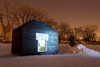 Modern home with Exterior, Shingles Roof Material, and Wood Siding Material. In responding to the harsh winter conditions of The River Trail, the design of the SMOKEHOUSE uses form and materiality to provide as well as signify shelter and warmth. Photo of Warming Hut