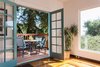 French doors lead to a peaceful deck space for outdoor dining Photo 7 of QUINTESSENTIAL BERKELEY modern home