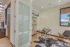 Modern home with Office, Desk, Chair, Light Hardwood Floor, and Den Room Type. Office/Downstairs Bedroom Photo 10 of The Rosewood Residence
