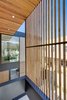 Modern home with Outdoor, Small Patio, Porch, Deck, Wood Patio, Porch, Deck, Stone Patio, Porch, Deck, Front Yard, Metal Patio, Porch, Deck, and Horizontal Fences, Wall. Front Balcony Photo 15 of The Rosewood Residence