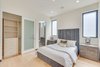 Modern home with Bed, Table Lighting, Recessed Lighting, Light Hardwood Floor, Accent Lighting, Ceiling Lighting, Storage, and Bath Room. 2nd Upstairs Bedroom Photo 16 of The Rosewood Residence