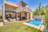 Modern home with Outdoor, Trees, Back Yard, Hardscapes, Grass, Swimming Pools, Tubs, Shower, Small Pools, Tubs, Shower, Large Patio, Porch, Deck, Salt Water Pools, Tubs, Shower, Standard Construction Pools, Tubs, Shower, Horizontal Fences, Wall, Wood Patio, Porch, Deck, and Concrete Patio, Porch, Deck. Back Exterior, Day Photo 20 of The Rosewood Residence