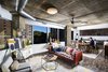Modern home with Living Room. Huge windows, tall ceilings, plank floors and designer kitchens create an atmosphere of luxury with a modern, industrial aesthetic. Photo 2 of e-lofts Alexandria