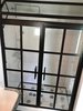 Modern home with Bath Room and Enclosed Shower. Steel Grid Shower Door with operable transom by Anderson Glass Photo of The Grid Shower by Anderson Glass