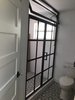 Modern home with Bath Room and Enclosed Shower. Steel Shower Door by Anderson Glass Photo 2 of The Grid Shower by Anderson Glass