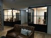 Modern home with Dining Room. Steel barn sliders by Anderson Glass Photo of The Steel Sliders
