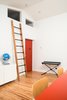 Modern home with Kids Room, Playroom Room Type, Storage, Bookcase, and Chair. Kid's Playroom Photo 3 of 20th Street