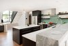 Modern home with Kitchen, Engineered Quartz Counter, Granite Counter, Wood Cabinet, Glass Tile Backsplashe, Ceiling Lighting, Refrigerator, Dishwasher, Pendant Lighting, Wine Cooler, Range, Undermount Sink, and Range Hood. Kitchen Photo 10 of 20th Street