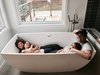 Modern home with Bath Room, Engineered Quartz Counter, Freestanding Tub, Ceramic Tile Wall, and Porcelain Tile Floor. The Beautiful Family Photo 5 of 20th Street