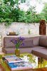 Modern home with Living Room, Sectional, Ceiling Lighting, Medium Hardwood Floor, and Standard Layout Fireplace. Detail at sitting area Photo 7 of Casa Sisal