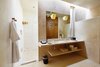 Modern home with Bath Room, One Piece Toilet, Stone Counter, Ceiling Lighting, Open Shower, Concrete Floor, Accent Lighting, and Concrete Wall. Master bath counter and shower Photo 9 of Casa Sisal
