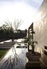 Modern home with Outdoor, Small Pools, Tubs, Shower, Large Patio, Porch, Deck, Concrete Patio, Porch, Deck, Flowers, and Landscape Lighting. One of five ponds outside of Casa Sisal Photo 13 of Casa Sisal