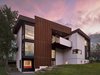 Modern home with Exterior, Flat RoofLine, Stucco Siding Material, Metal Siding Material, House Building Type, and Glass Siding Material. The house is zero-energy ready. The completed project has been 3rd party tested and received Arlington Green Home Choice Platinum certification (and the highest point rating of the 65 homes approved last year). Photo of Arlington Solar