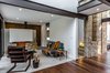 Modern home with Living Room, Ceiling Lighting, Recessed Lighting, Sofa, Standard Layout Fireplace, and Wood Burning Fireplace. Main entrance Photo 13 of CQ12