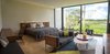 Modern home with Bedroom, Chair, Ceiling Lighting, Bed, Travertine Floor, and Marble Floor. Master bedroom Photo 17 of Casa Chaaltun