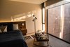 Modern home with Bedroom, Chair, Travertine Floor, Accent Lighting, Marble Floor, and Floor Lighting. Bedroom Photo 9 of Casa Chaaltun