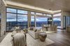 Modern home with Dining Room, Chair, Table, Ceiling Lighting, Recessed Lighting, Accent Lighting, Medium Hardwood Floor, Dark Hardwood Floor, Two-Sided Fireplace, and Gas Burning Fireplace. When open, the folding wall blurs the distinction beside inside and outside. Photo 3 of Two Creeks
