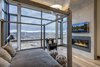 Modern home with Bedroom, Bed, Night Stands, Medium Hardwood Floor, Dark Hardwood Floor, Chair, Ceiling Lighting, Pendant Lighting, and Recessed Lighting. All 6 bedrooms afford walkout patios and incredible mountain scenes. Photo 6 of Two Creeks