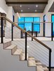 Modern home with Staircase, Wood Tread, and Cable Railing. The centralized vertical circulation is both a functional and visual feature of the space. Photo 9 of Terrace Drive