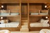 Modern home with Bedroom. A lavish bunkroom, well-appointed guest rooms, and a ski room all steps away from the slopes, make this the ultimate family getaway. Photo 15 of Two Creeks