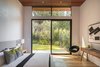 One of three Upper Level Bedrooms seamlessly flows out to private front yard Photo 18 of Ross Modern modern home