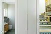 Modern home with Storage Room, Closet Storage Type, Under Stairs Storage Type, and Cabinet Storage Type. at the entrence Photo 9 of An Ideal Home Renovation for the Golden Years