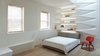 Modern home with Living Room, Wall Lighting, Recessed Lighting, Medium Hardwood Floor, Bookcase, and Bench. Bedroom Photo 8 of K Residence