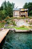 Modern home with Outdoor, Shrubs, Back Yard, Wood Patio, Porch, Deck, Trees, and Grass. Lake Chelan Photo 6 of Lake Chelan
