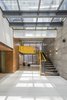 Sculpturesque yellow staircase at the basement Photo 5 of House B123 modern home
