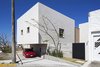 Modern home with Kitchen. South Facade: Garage. Photo 3 of Casa Iguana