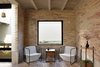 Modern home with Chair, Windows, and Sliding Window Type. Dining room. Photo 9 of Casa Iguana