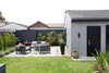 Modern home with Trees, Shrubs, Grass, Hardscapes, Hanging Lighting, Walkways, Doors, Exterior, Swing Door Type, and Metal. Backyard Seating & Fire Pit Photo 12 of Del Rey Residence