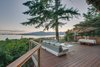 Modern home with Outdoor, Back Yard, Slope, Woodland, Trees, and Large Patio, Porch, Deck. Lower deck Photo 14 of Bayview Road